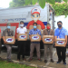 Tim JNE dan pihak Klinik Mata Alla saat serah terima donasi ribuan Al Quran