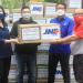 Penyerahan donasi masker dari Alpha JWC Ventures yang akan didistribusikan oleh JNE