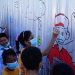 JNE Denpasar undang anak melukis mural