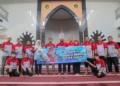 karyawan jne gelar bersih-bersih masjid