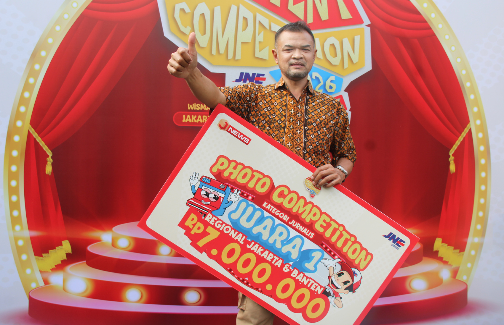 jurnalis foto kompas raih karya foto terbaik di JNE Content Competition untuk region Jakarta dan Banten